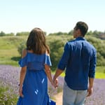 Couple Walking In Flower Garden Video
