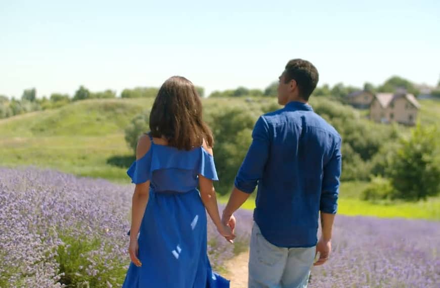 Couple Walking In Flower Garden Video